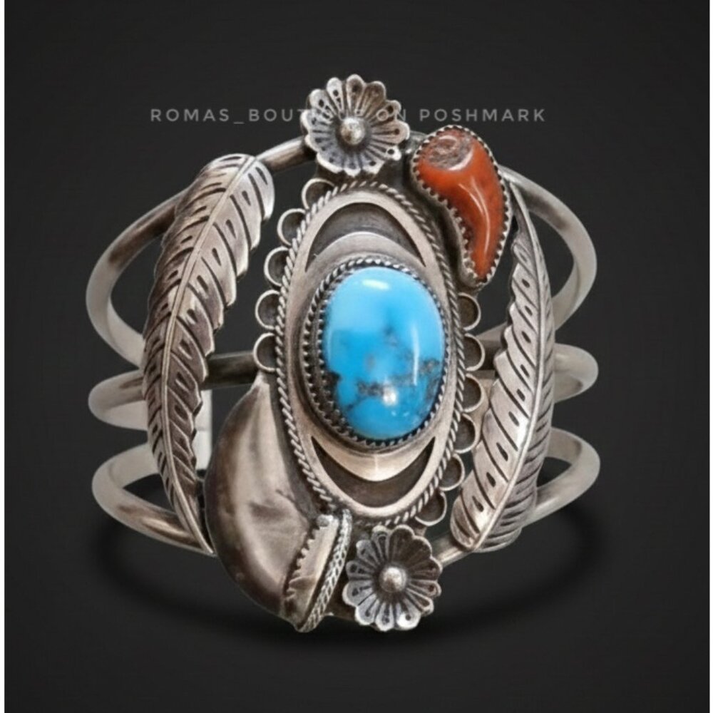 Navajo sterling silver cuff bracelet turquoise, coral, a bear claw, and feather